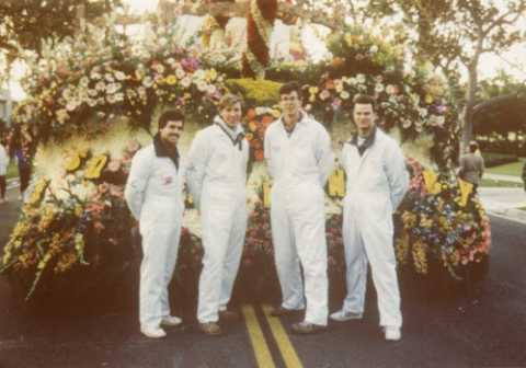 Harrigan (far right) in front of 1992 float "Squeaking By"