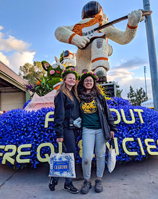 Strong in front of 2019 float "Far Out Frequencies"