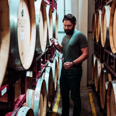 Eric Johnson working in the barrel room of winery