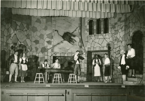 “The Black Flamingo,” the Campus Playhouse’s biggest production of the 1930 academic year, was held in May of 1931 at Crandall Gym. Armendáriz, pictured seated right at the table, played the villainous inn owner. 