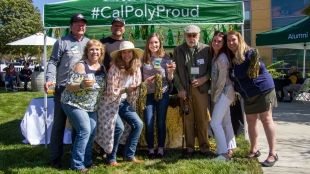 Cal Poly alumni smiling for the camera.