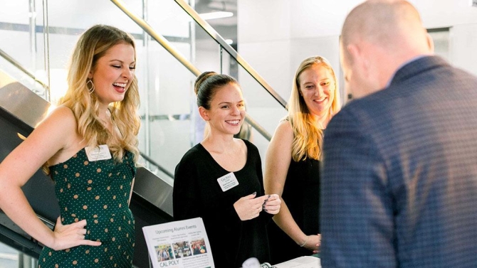 Three Cal Poly Alumni at a chapter event