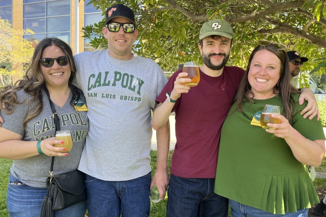 Cal Poly Alumni smiling for the camera 