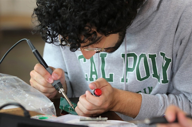 Cal Poly student working in a lab.