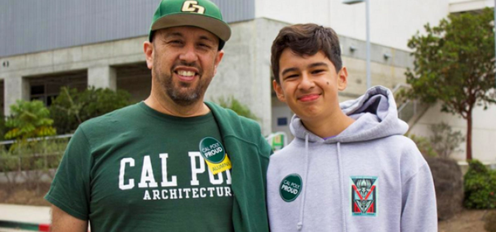 Alumni smiling for the camera.