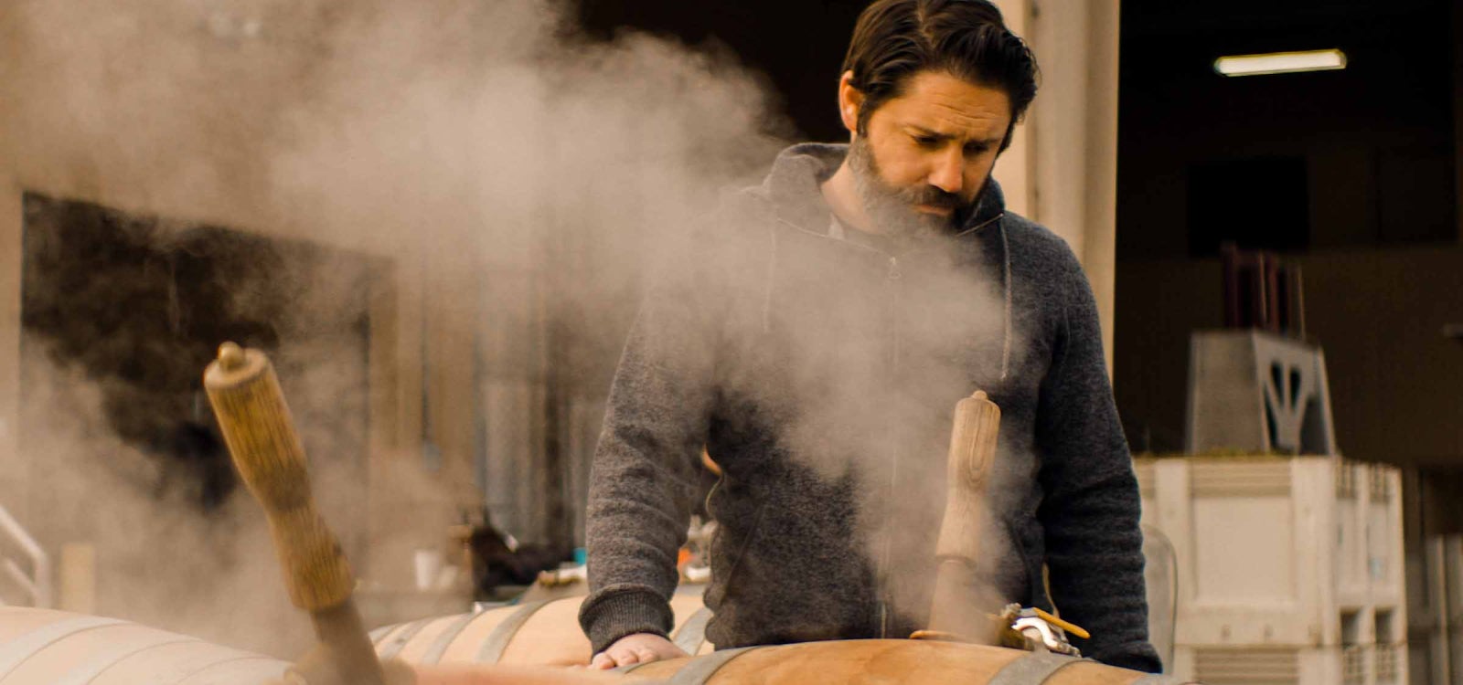Eric Johnson working in the barrel room of winery