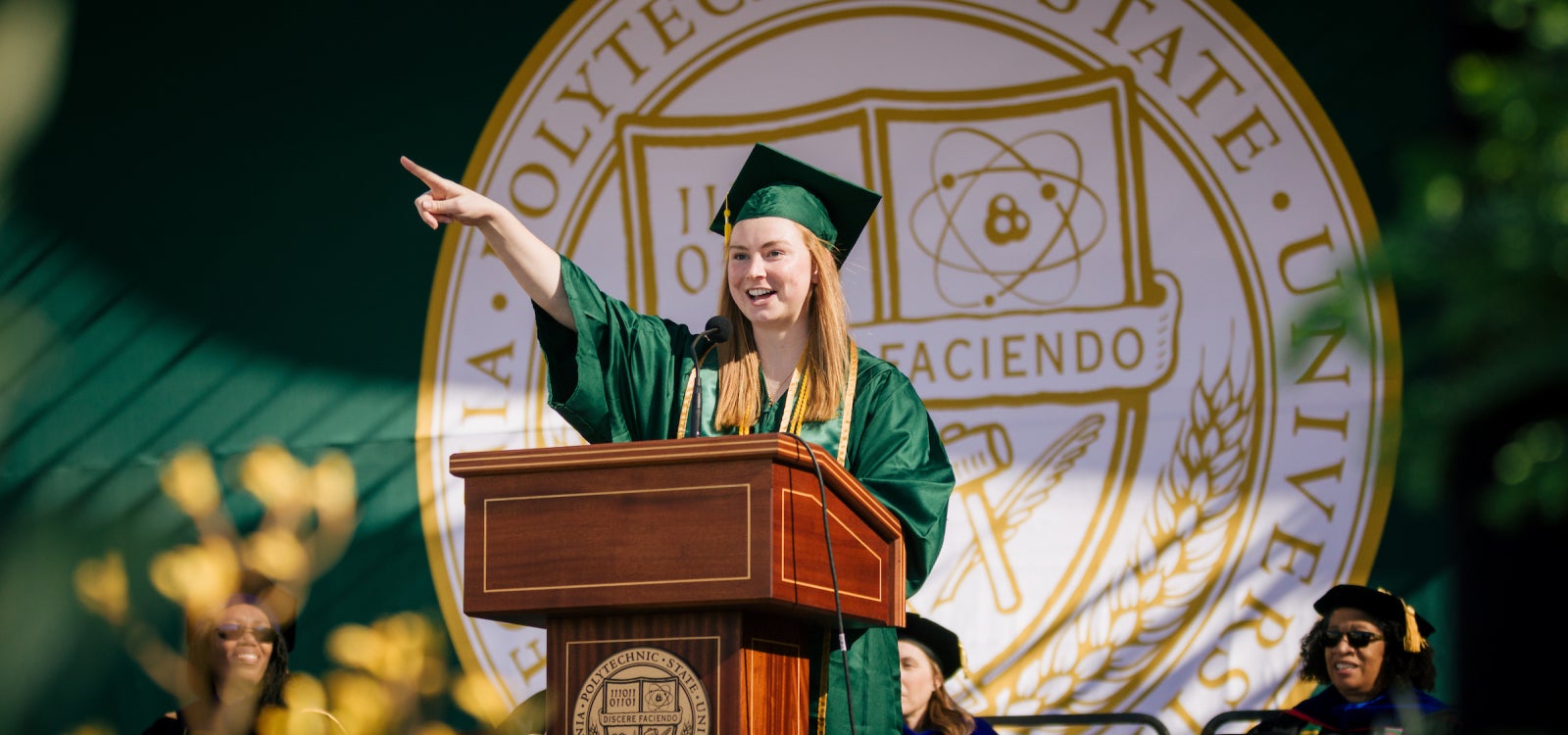 2021-22 ASI President, Tess Loarie, giving a speech at the 2022 Commencement.