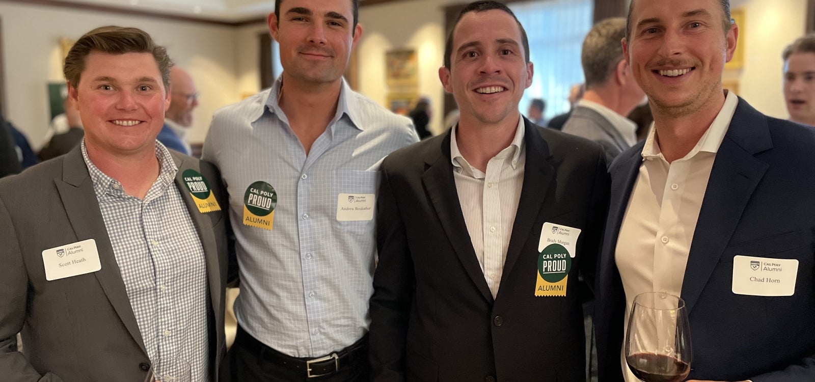 Alumni smiling for the camera