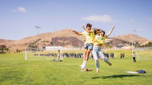 Two WOW leaders jump together at WOW-A-Rama.