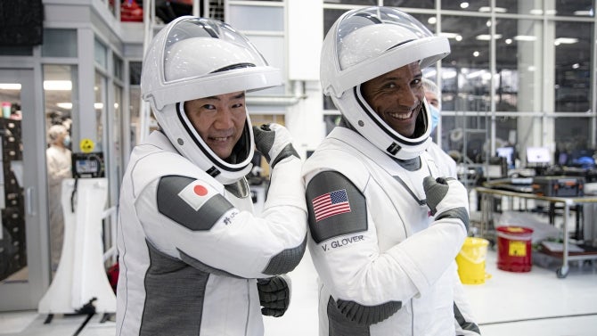 Soichi Noguchi, Japan Aerospace Exploration Agency (JAXA) astronaut, and pilot Victor Glover participate in crew equipment interface testing at SpaceX headquarters in Hawthorne, California, on Sept. 24, 2020. 