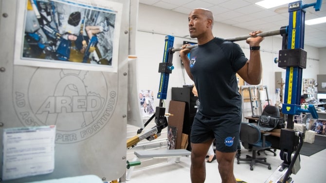 NASA commercial crew astronaut Victor Glover performs physical training on the Advanced Resistive Exercise Device (ARED) at the agency’s Johnson Space Center in Houston.