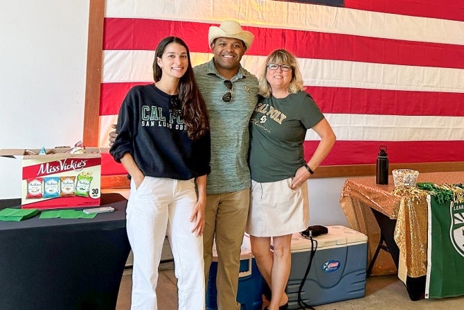 Cal Poly Alumni smiling for the camera 