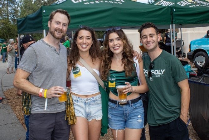 Cal Poly Alumni smiling for the camera 