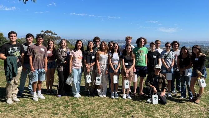 Cal Poly students smiling for the camera.