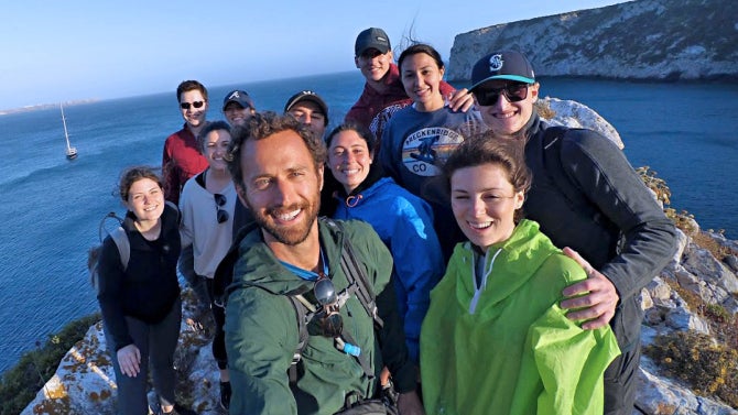 Alumni smiling for the camera in Portugal
