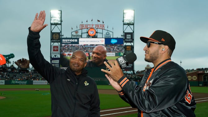 Cal Poly Alumni being interviewed at Oracle Park.