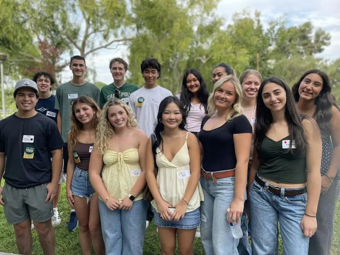 A group smiles for the camera
