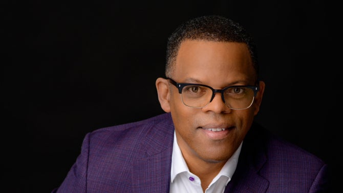 A portrait of alum Clayton Mitchell (Industrial Engineering, '85).
