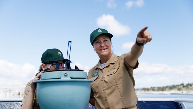 Maritime Alum Capt. Samar Bannister with a cadet on TS Golden Bear. 