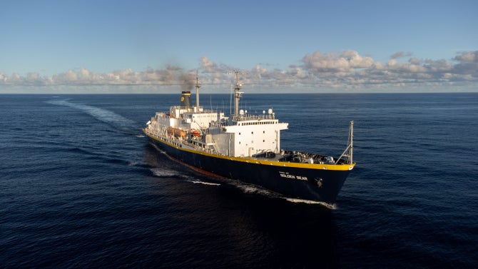 An aerial photo of TS Golden Bear on the water. 